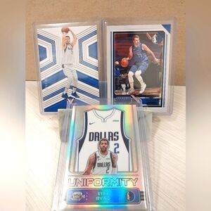 Luka Donic 24/149 Luka Donic 33/99 and Kyrie Irving Silver